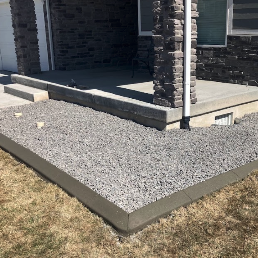 Picture of a home with newly made concrete.